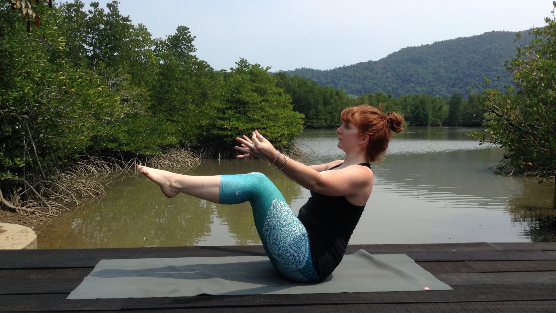 Yoga teacher Alison Reaume in boat, pigeon and low lunge poses
